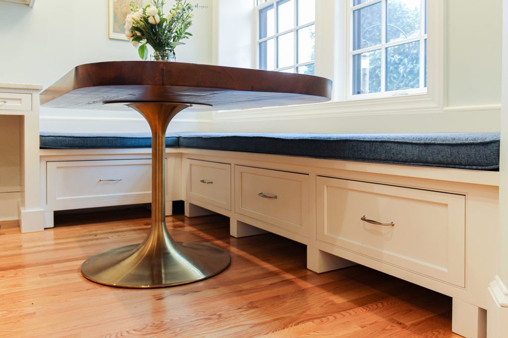 Airy transitional kitchen custom under bench storage