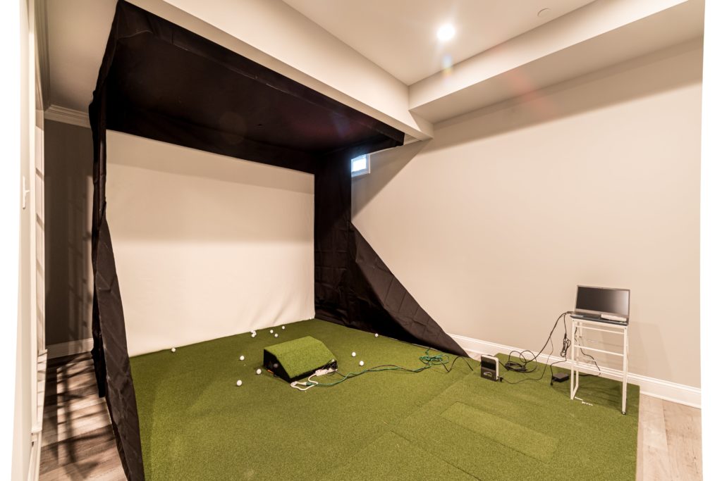 Ultimate man cave basement renovation interior golf simulator addition