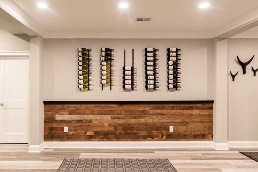 Ultimate man cave basement renovation rustic wine wall