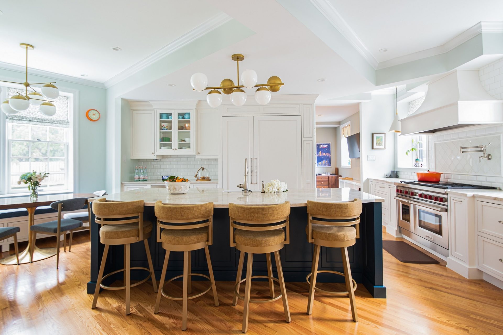 airy transitional kitchen blue island custom cabinetry
