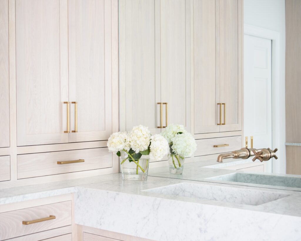 Step into luxury with our latest bathroom renovation, a sophisticated oasis by our team at Gardner/Fox and Glenbrook Custom Cabinetry. Soft tones, a freestanding tub and brushed gold accents create for an airy, glamourous retreat, fusing style with comfort. The focal point is an ombre-tiled shower, a modern marvel that seamlessly blends chic design and functionality, turning every shower this shower into a spa-like experience.